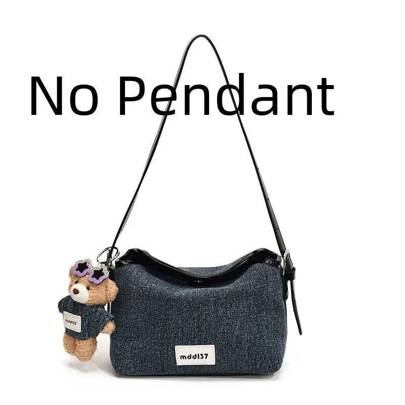 Denim small crossbody bag in black with slit pocket, horizontal square shape, medium hardness, polyester lining.