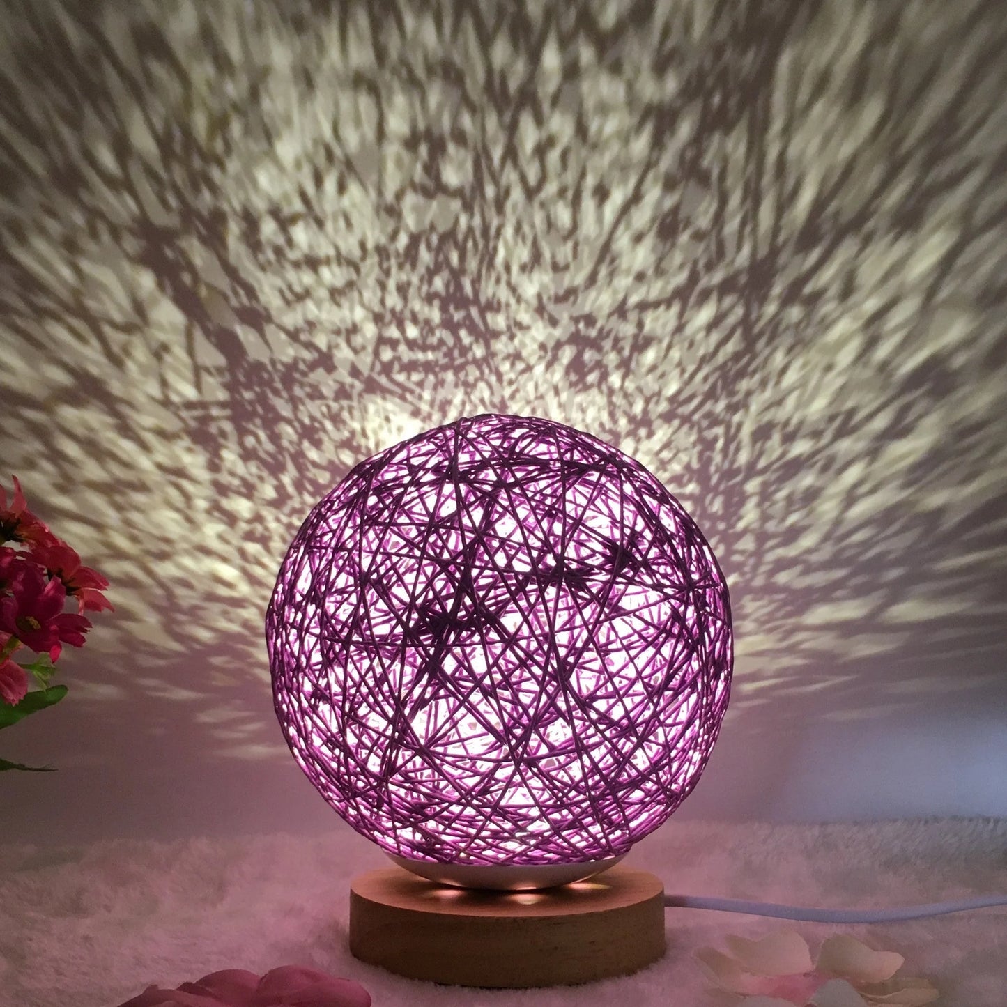 LED rattan table lamp with hand-knit lampshade in various colours
