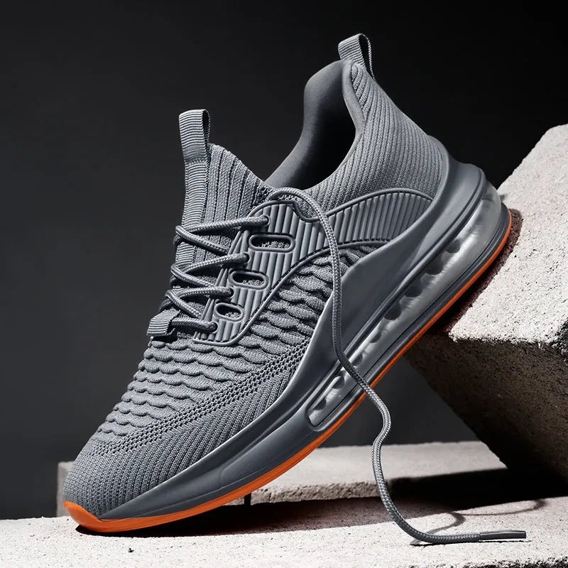 Men's black mesh running shoes with rubber sole and lace-up design for sports