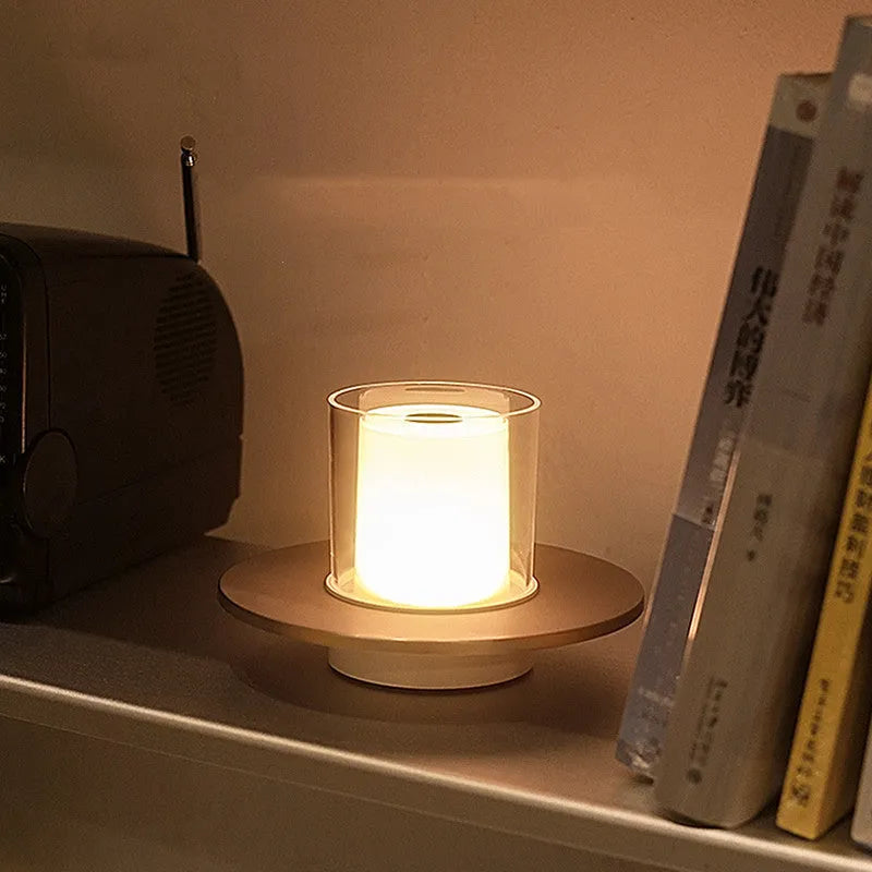 Bar table lamp candle light gold finish with warm glow on a table