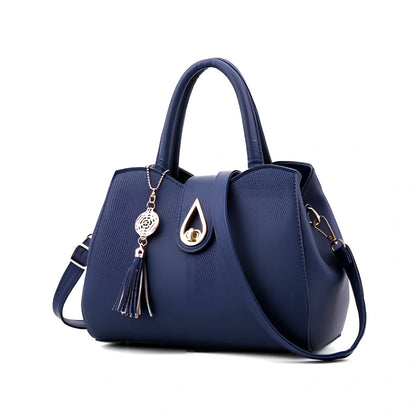 Women's litchi pattern PU leather tote bag with zipper closure and adjustable shoulder strap showing internal pockets