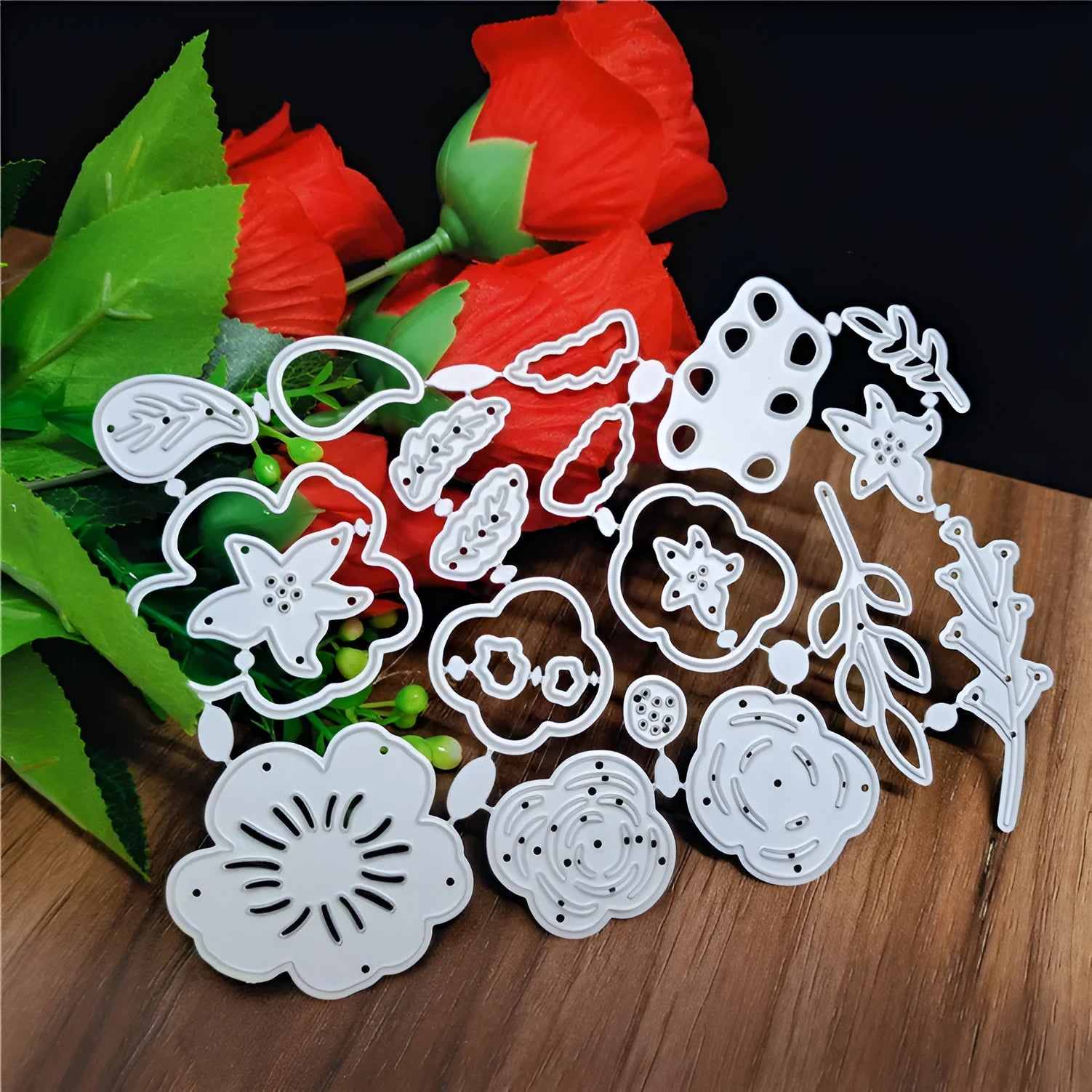 Silver carbon steel flower knife mould for paper cutting measuring 14.3 x 9.9 cm