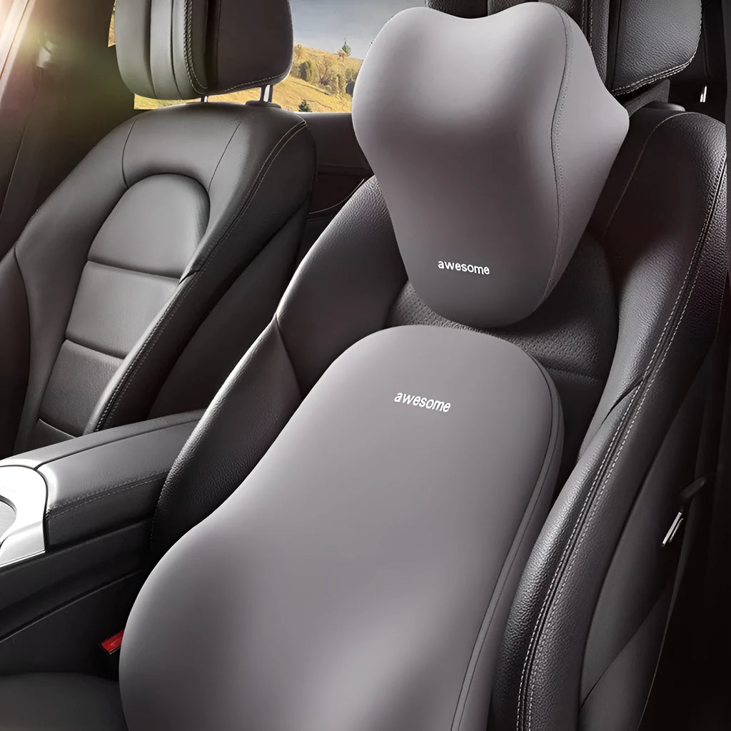 Y-type beige automotive headrest pillow and lumbar support pillow set with memory foam filling on a car seat