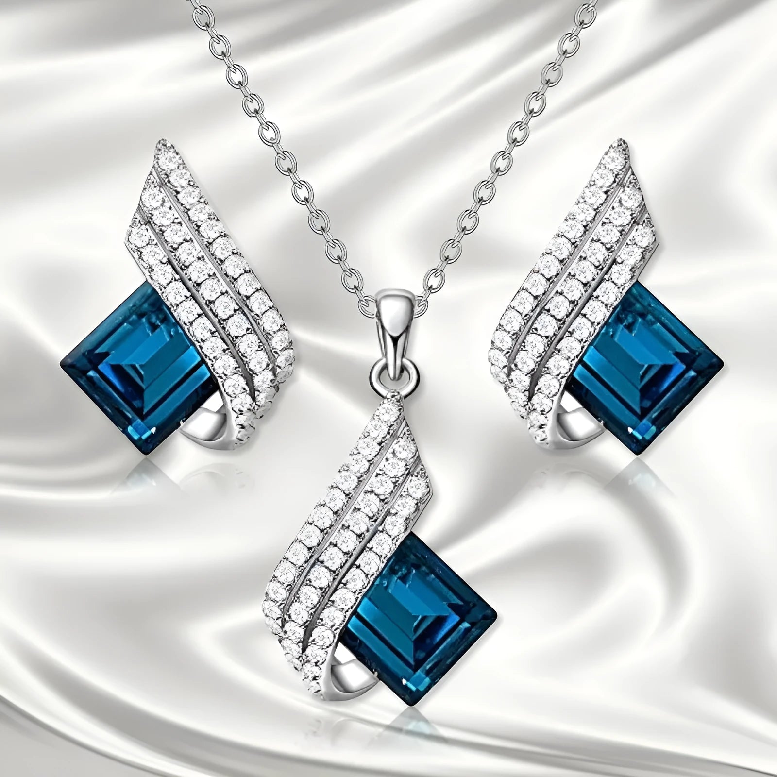 Women's alloy pendant necklace and matching stud earrings set with cross chain and glass accents