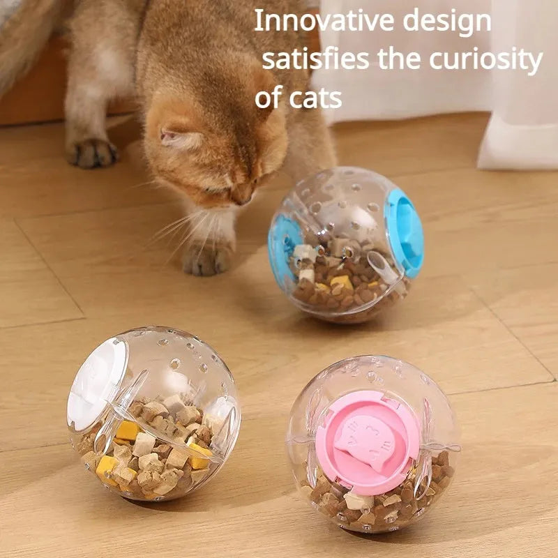 Blue slow feeding ball for cats with visible food compartment, 11.5cm diameter