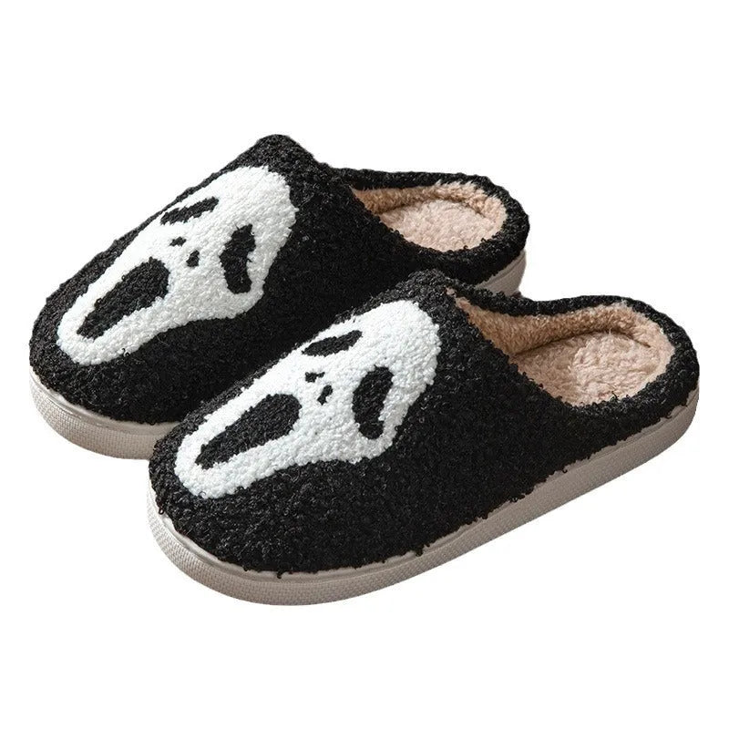 Halloween couple indoor slippers with embroidered lightning ghost face on suede upper in various colours.