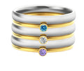 Titanium steel December birthstone ring with gold engraved lettering on a geometric band.