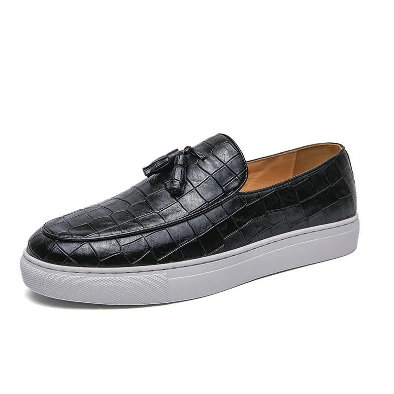 Men's black artificial PU sneakers with tassel detail and a round toe, displayed on a white background.