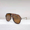 Women's large frame sunglasses with black leopard print pattern and elliptical shape