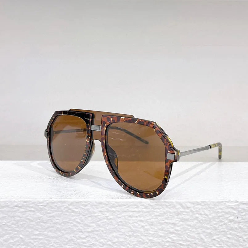 Women's large frame sunglasses with black leopard print pattern and elliptical shape