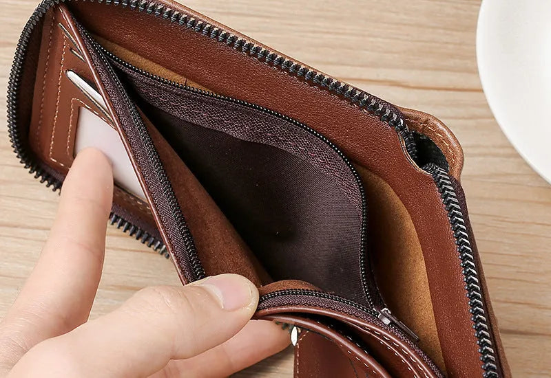 Men's short casual zipper wallet in black polyurethane leather with horizontal square shape and sewing thread detailing.