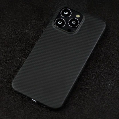 Matte black Kevlar fibre iPhone 12 case with crater texture and exposed buttons for drop protection