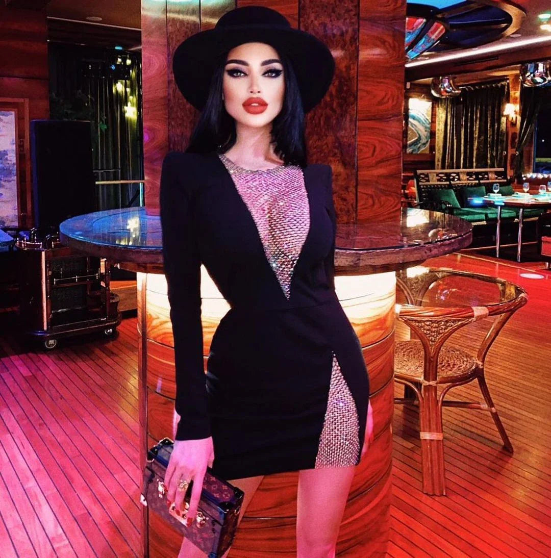 Alluring black cocktail dress with diamond-patterned mesh and long sleeves, perfect for a night out or special event