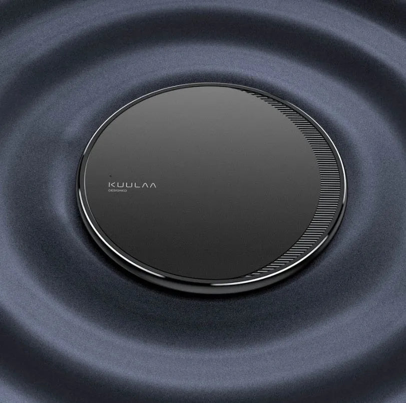 Black Kuulaa wireless disc phone charger with Micro USB port and LED indicator light