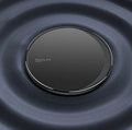 Black Kuulaa wireless disc phone charger with Micro USB port and LED indicator light