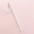 White and black gel pen with removable paper crane and rabbit pendant charms on a 17cm plastic body