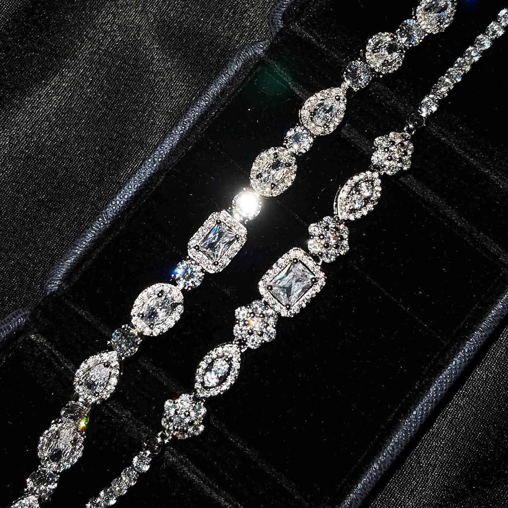 Women's silver-plated bracelet with sparkling zircon stones in a geometry shape.