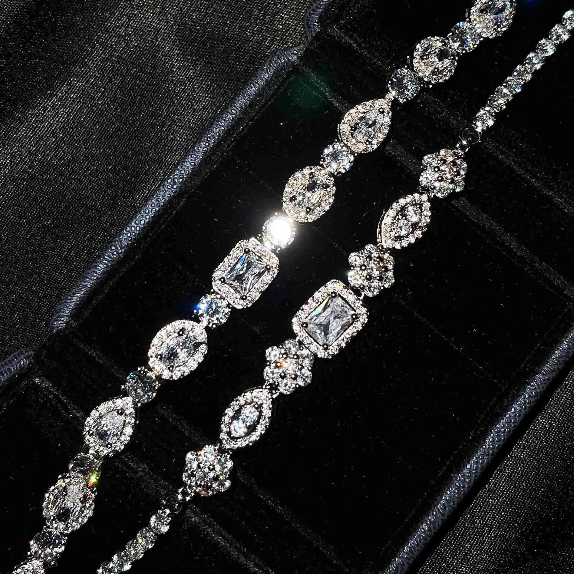 Women's silver-plated bracelet with sparkling zircon stones in a geometry shape.