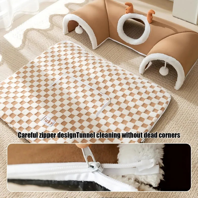 Cat tunnel bed in brown plaid fleece with hanging balls, semi-circular shape, slip-resistant bottom