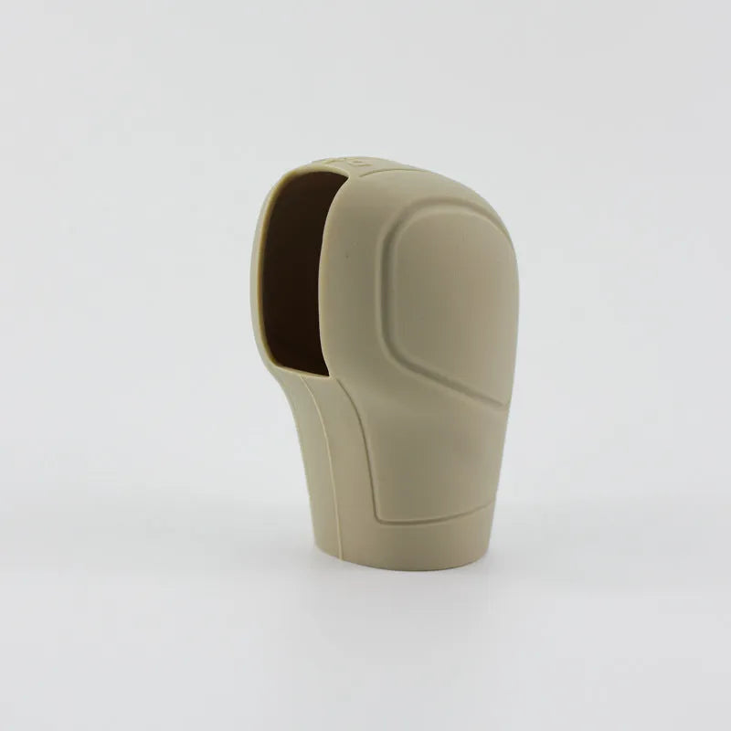 Universal silicone gear wave sleeve for automatic car gear stick, black colour, close-up on gear lever