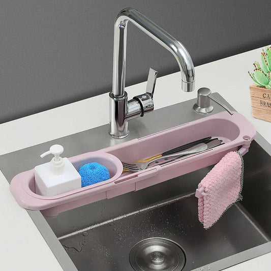 Adjustable sink caddy with storage compartments and drainage system for organizing kitchen sinks