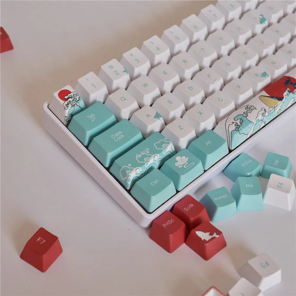 Coral Sea themed PBT plastic keycap set for mechanical keyboards, showing 104 colourful keys.
