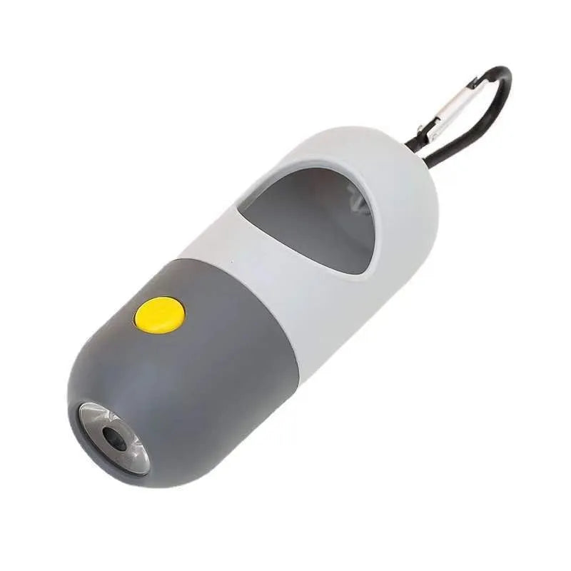 Compact LED pet waste bag dispenser in blue grey with a dog lead attachment and illuminated button