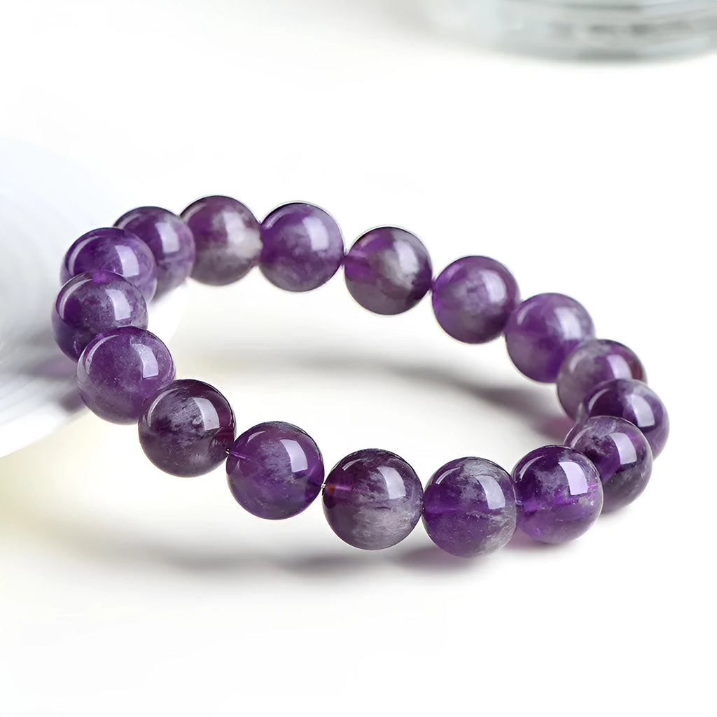 Natural feather amethyst crystal bracelet with Snow Mountain purple scattered beads and Ruyi design.