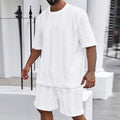 Men's knitted jacquard summer casual set with short-sleeve pullover and matching shorts in solid colour