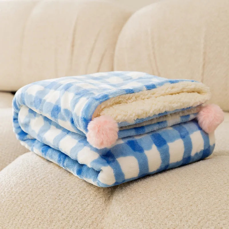 Blue coral fleece pet blanket showing soft texture, laid flat to show size.