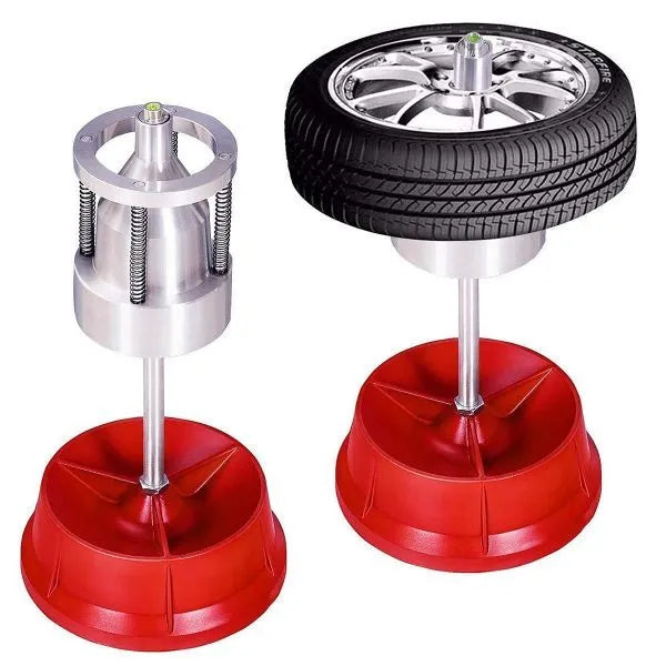 Portable aluminium hub wheel balancer with bull's eye level on enamel base.