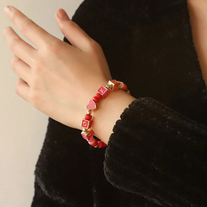 Original design beaded necklace and bracelet set with English letter pendants, perfect for personal expression.