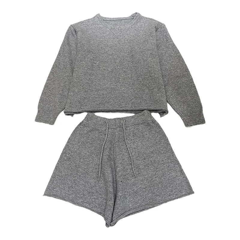 Women's loose-fit acrylic knit sweater and wide-leg shorts co-ord set in oatmeal colour.
