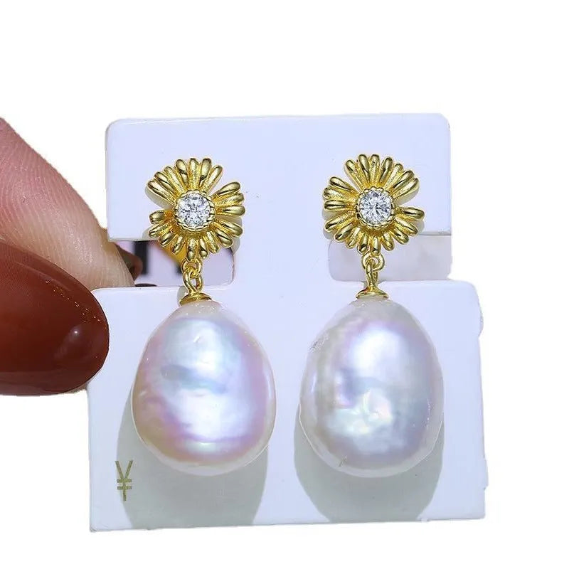 Pair of S925 sterling silver baroque flower earring frames on a plain background.