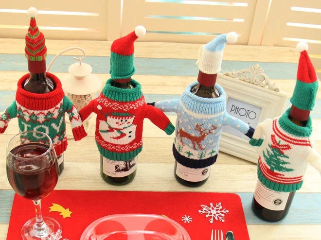 Knitted Christmas Bottle Set with festive designs including Joy, Christmas tree, elk, and snowman