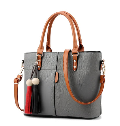 Women's black PU slung shoulder bag, 25cm height, adjustable strap for diagonal carry with phone and wallet inside