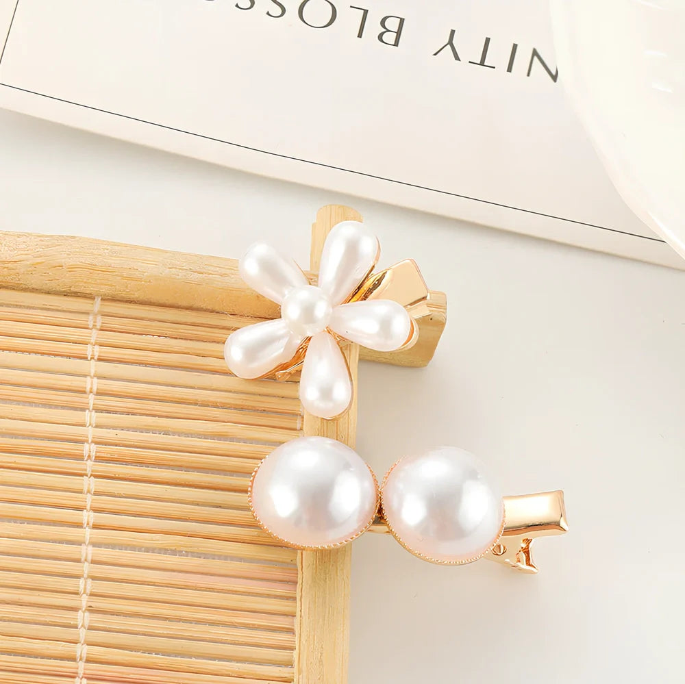 Slip-on pearl bow hair clip in alloy with flower at 2.4cm and pearls up to 7.2cm, secure grip design
