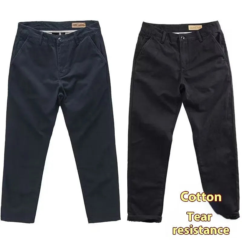 Men's slim-fit casual trousers in black with an elastic waistband and straight-leg cut.