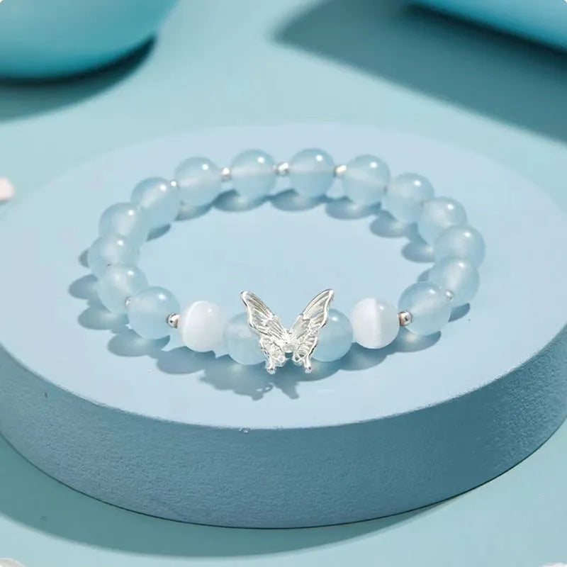 Women's crystal cat eye bracelet with butterfly charm and bow design in princess style