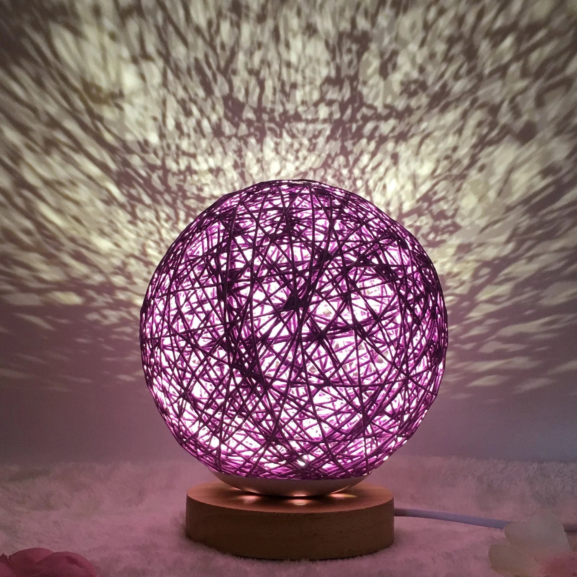 LED rattan table lamp with hand-knit lampshade in various colours