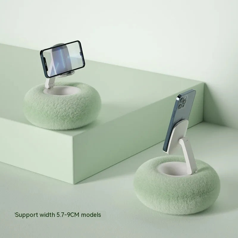 Adjustable rotating desk bracket holding a tablet, showing height extension and clamp mechanism.