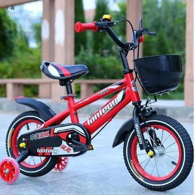 Blue children's mountain bike with adjustable seat and removable stabilisers on grass