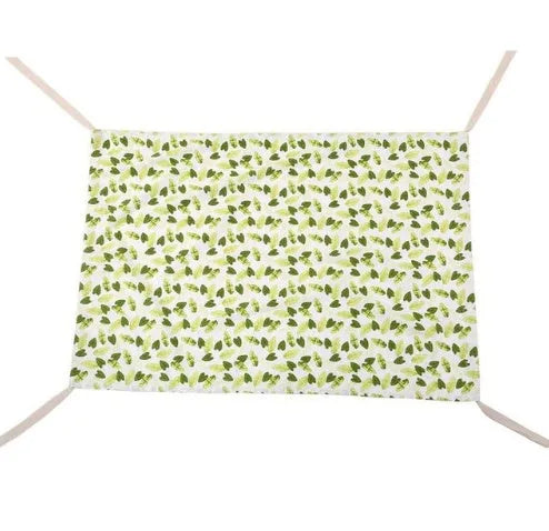 Portable crushed velour baby hammock attached to a crib, shown in pink colour.