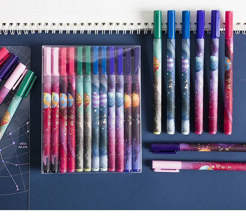 Set of twelve plastic ballpoint pens with different constellation and zodiac designs