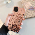 Clear electroplated rose gold iPhone back cover case on an iPhone 15 Pro Max.