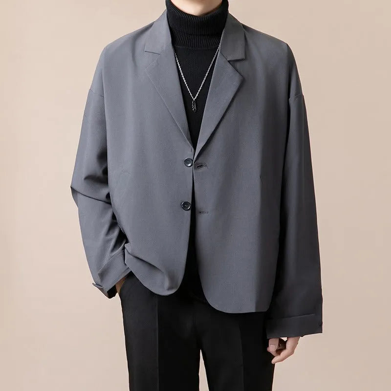 Loose casual suit jacket in polyester blend fabric available in four colours