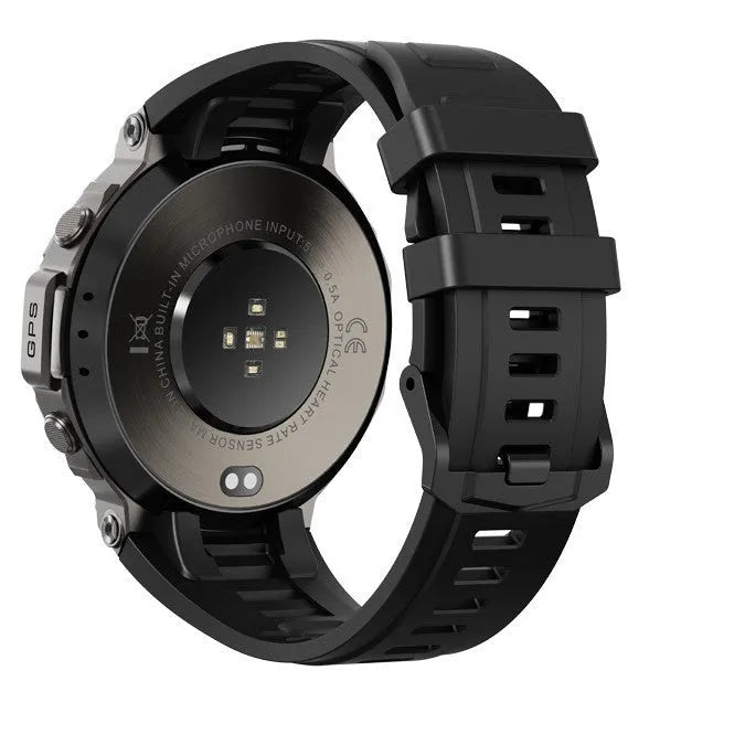 Black smart watch with AMOLED screen showing outdoor compass and heart rate data on wrist