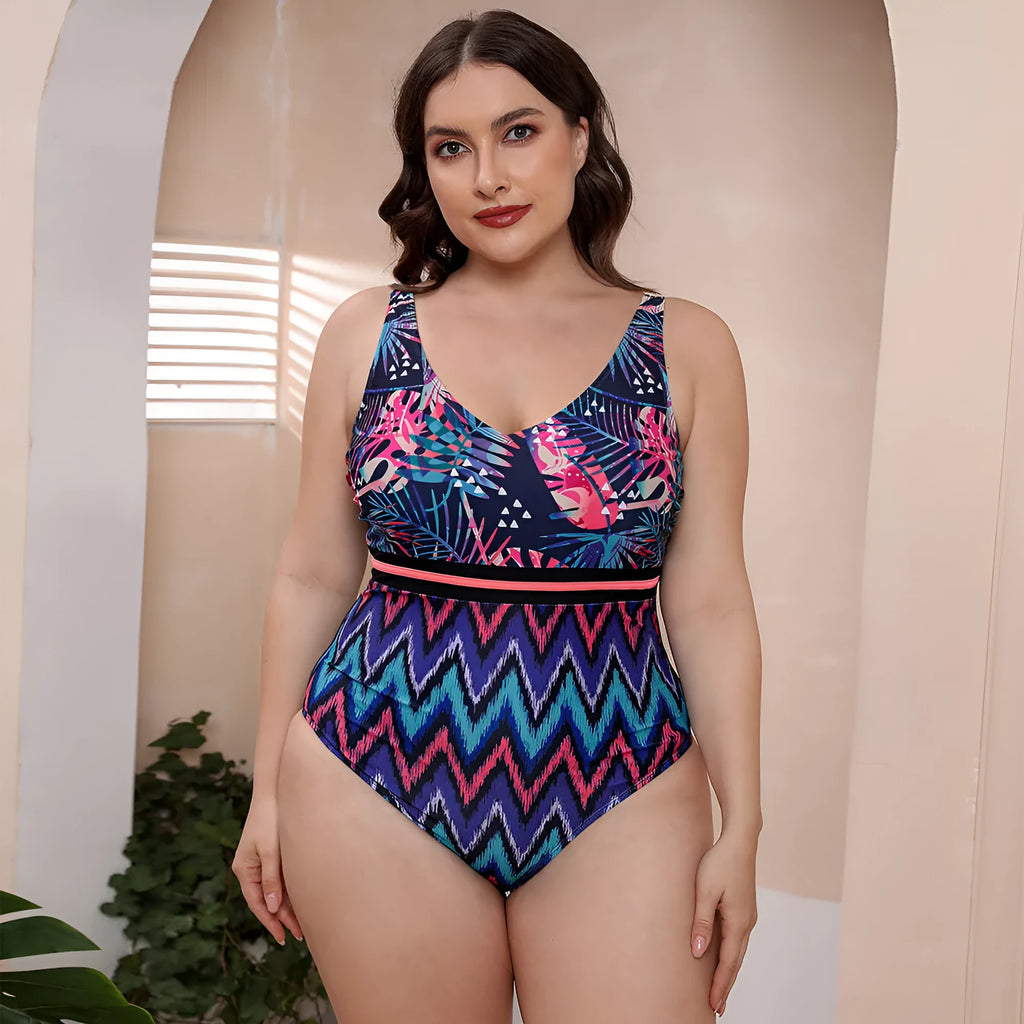 Women's blue printed one-piece swimsuit with spaghetti straps and a striped vest design laid flat.