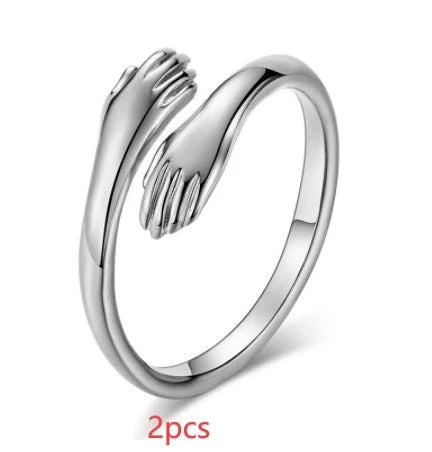 Adjustable Alloy Hands Hug Ring in silver and gold with geometry design