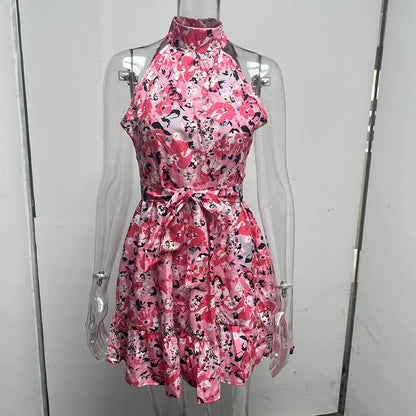 Floral print halter dress with adjustable lace-up back, available in yellow and pink colors